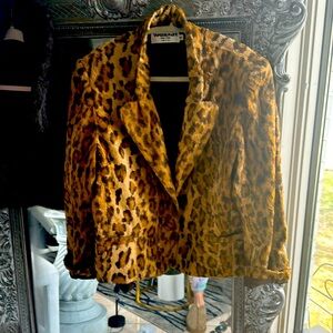 Branding is Tapemeasure out of New York.It has a leopard vintage look very cool